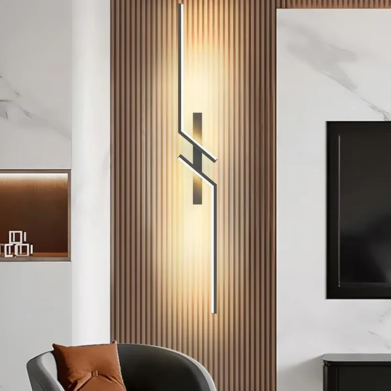 Modern Minimalist LED Wall Lamp illuminating a cozy bedroom