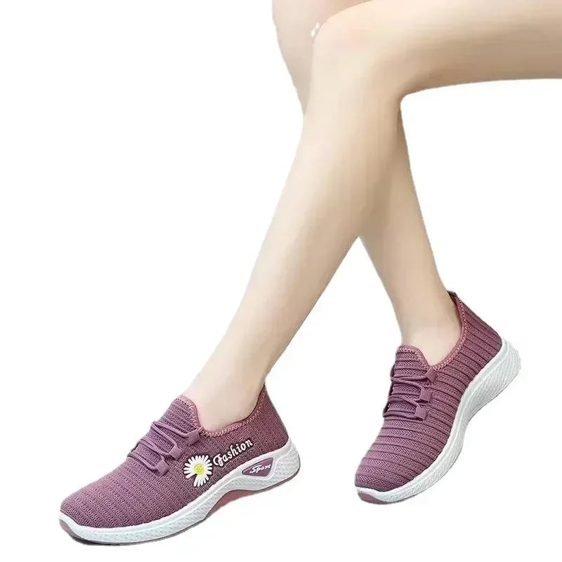 Woman wearing lightweight breathable casual sneakers outdoors