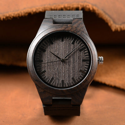Engraved wooden watch