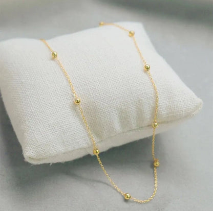 Gold ball bead necklace