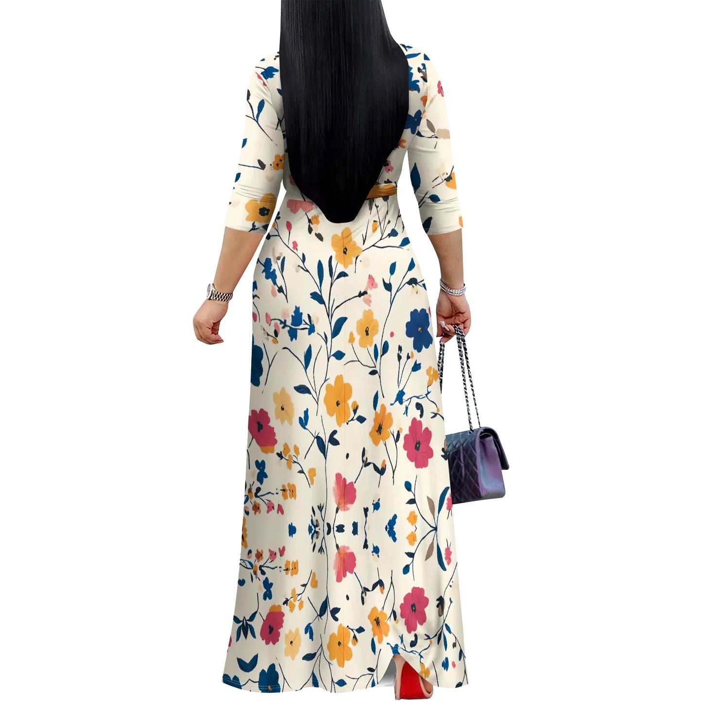 Woman in a vintage floral maxi dress with V-neck and ruched belt, perfect for casual summer style.