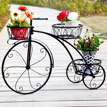 3 tier bicycle plant stand for decorative garden or indoor flower display

