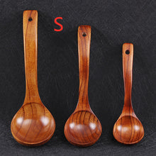 Curved handle spoon