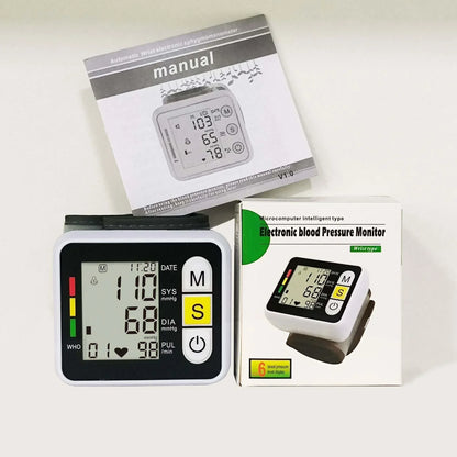 Digital wrist blood pressure monitor with LCD display for heart rate and pulse
