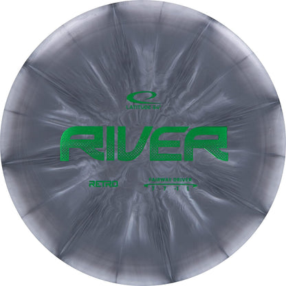 Easy-to-throw Latitude 64 River disc golf driver. Great for beginners, straight flying, unique burst design, 170g+, color varies (orange).

