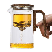 Elegant heat-resistant glass teapot with built-in infuser for herbal tea