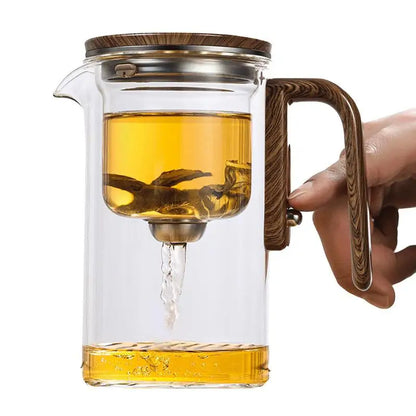 Elegant heat-resistant glass teapot with built-in infuser for herbal tea