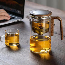 Elegant heat-resistant glass teapot with built-in infuser for herbal tea