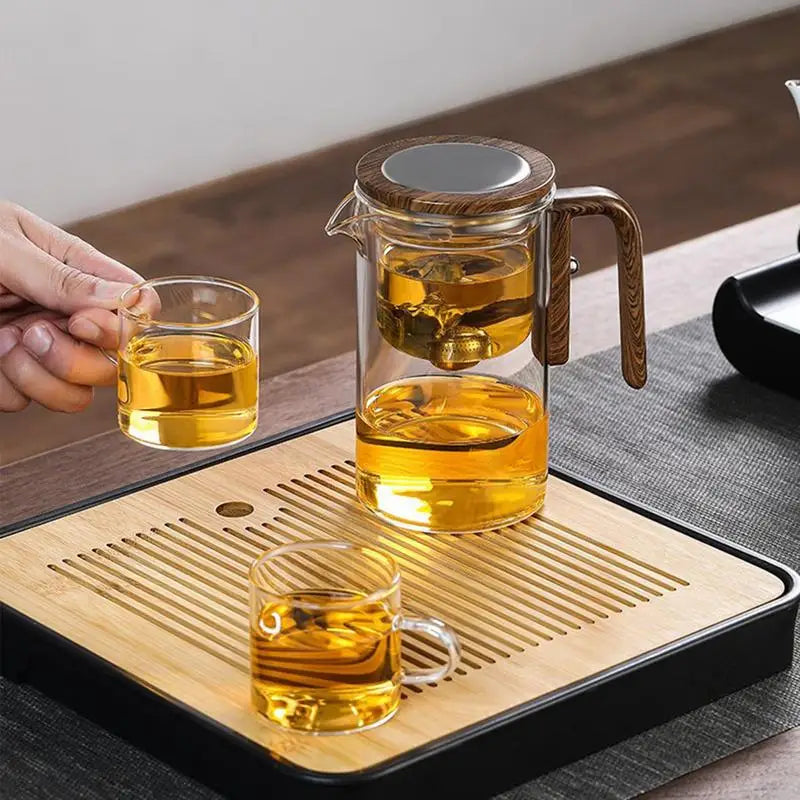 Elegant heat-resistant glass teapot with built-in infuser for herbal tea