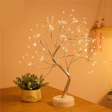 Enchanted fairy tree lamp glowing with LED lights for magical home decor