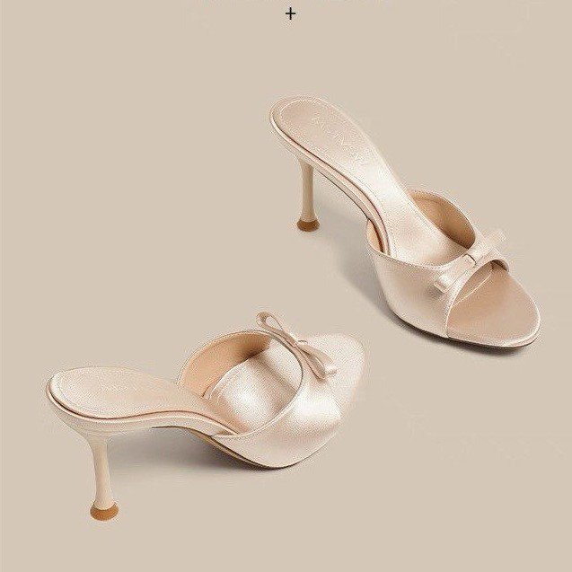 Women bow heel mules