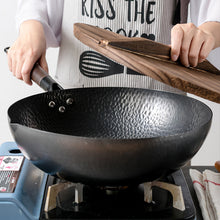 Handmade traditional iron wok for authentic stir-fry and cooking