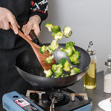 Handmade traditional iron wok for authentic stir-fry and cooking