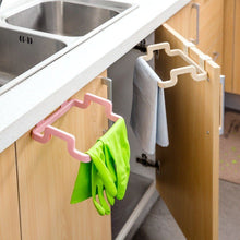 Hanging trash bag organizer