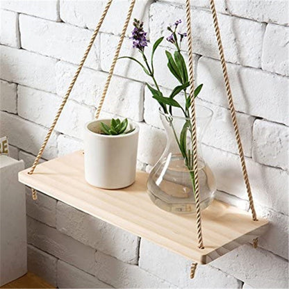 Indoor plant floating shelf used for wall-mounted houseplant display

