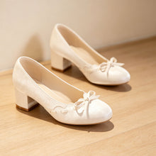 Ivory Bow Block Heel Pumps