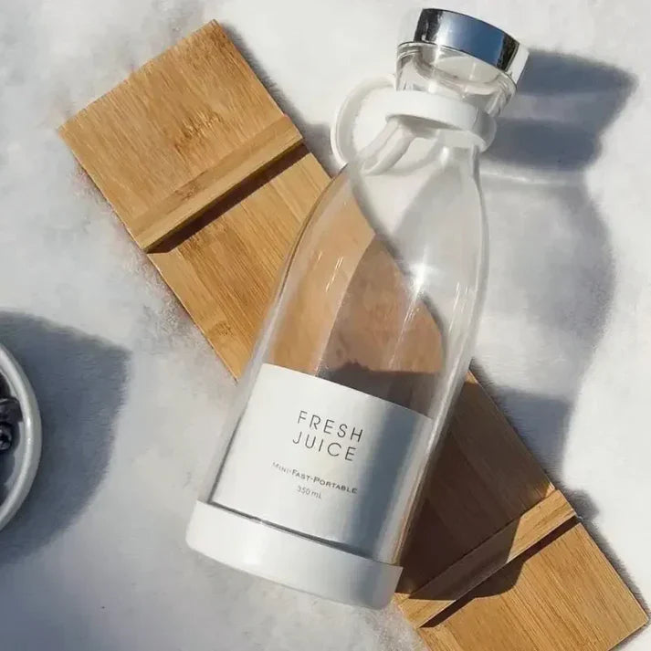 Portable mini blender by FreshJuice for smoothies and juices on the go