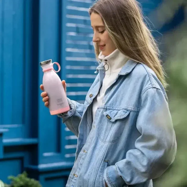Portable mini blender by FreshJuice for smoothies and juices on the go