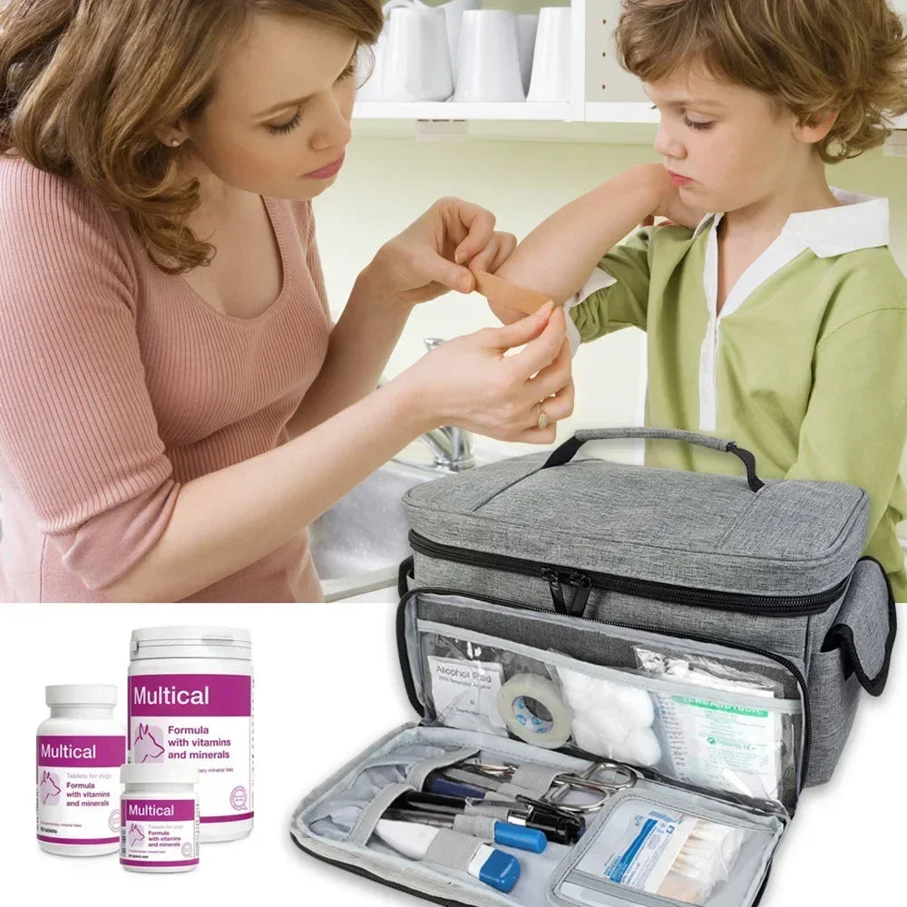 Portable travel first aid kit bag with layered medical compartments