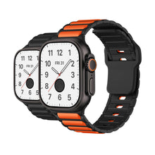 Sporty silicone band for Apple Watch Ultra with striped athletic design


