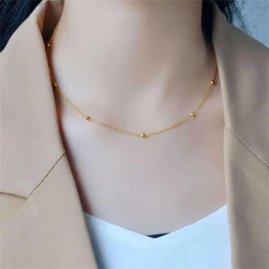 Gold ball bead necklace