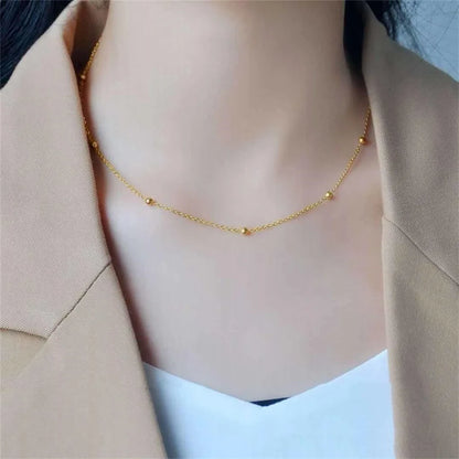 Gold ball bead necklace