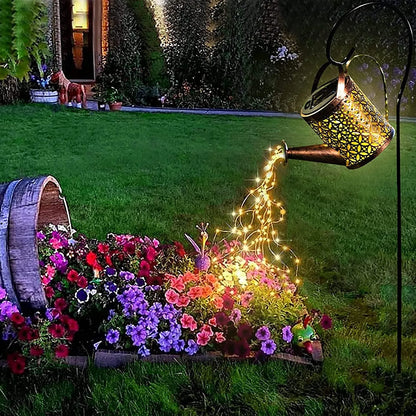 Solar powered watering can used for automatic watering of garden plants