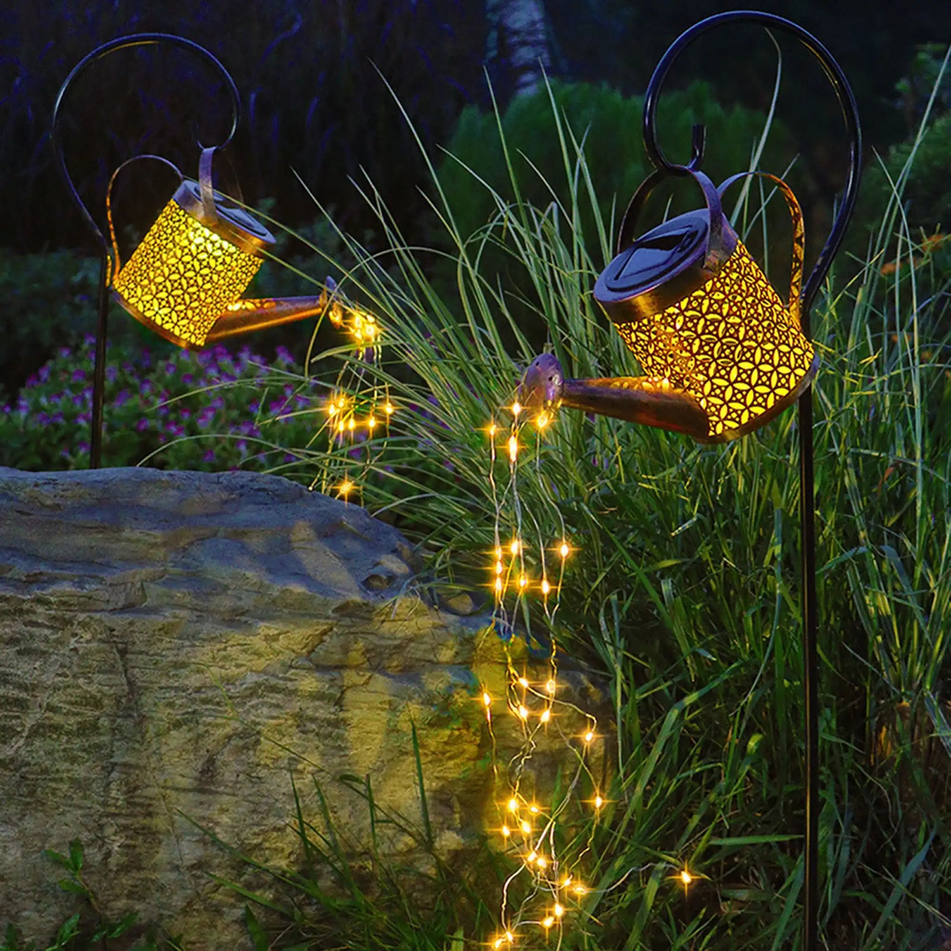 Solar powered watering can used for automatic watering of garden plants
