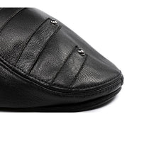 "Stylish leather beret for men in vintage black design"

