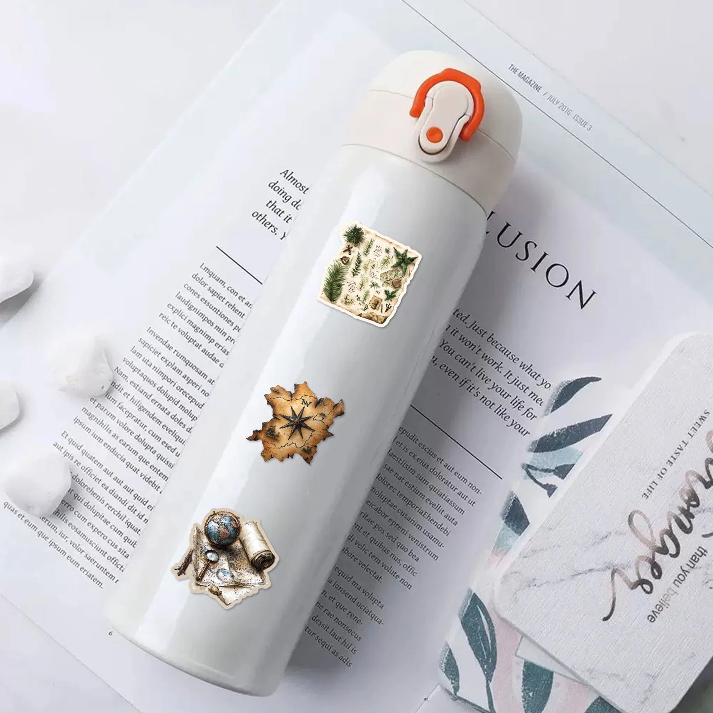 Vintage World Map Stickers on a water bottle for scrapbooking decor