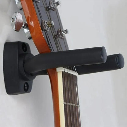 Heavy-duty guitar holder wall mount with padded hook for secure instrument display

