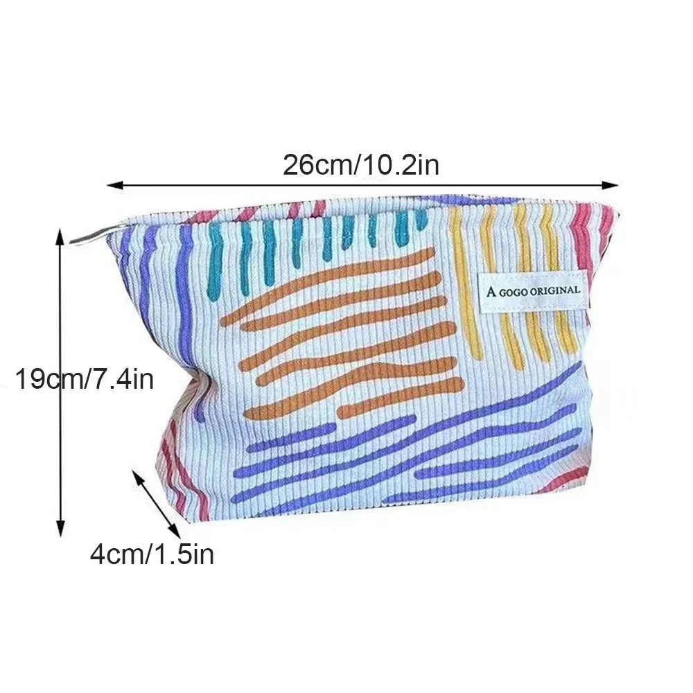 Corduroy cosmetic bag with colorful stripes for travel, skincare, and makeup storage

