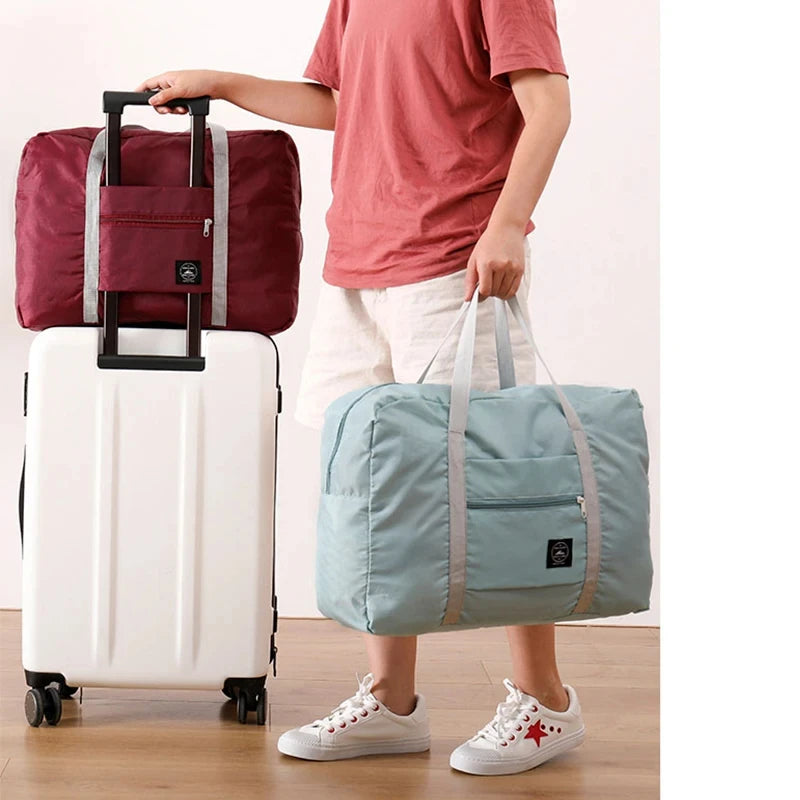 Foldable travel duffel bag for women with large capacity and lightweight design, ideal for carry on, sports, and weekend trips


