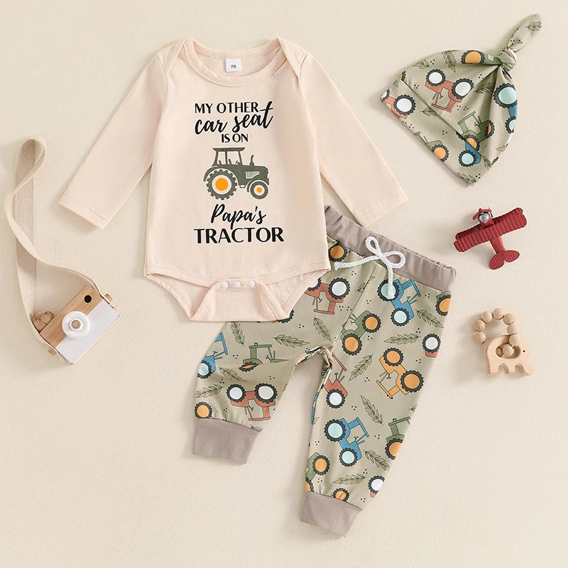 Newborn baby boy wearing 3 piece fall outfit with romper and tractor pants

