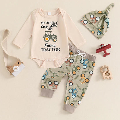 Newborn baby boy wearing 3 piece fall outfit with romper and tractor pants

