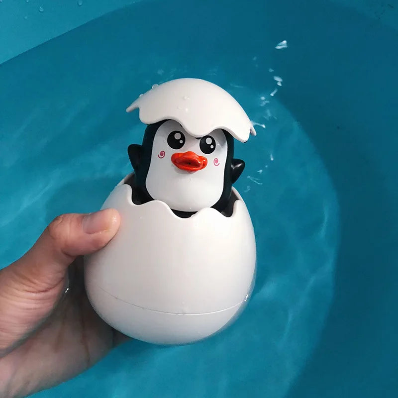 Colorful cute water egg toy for toddlers in bath and pool play

