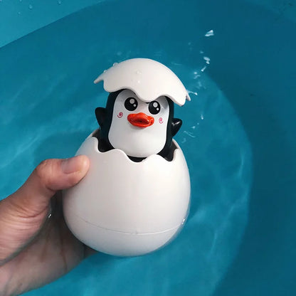 Colorful cute water egg toy for toddlers in bath and pool play

