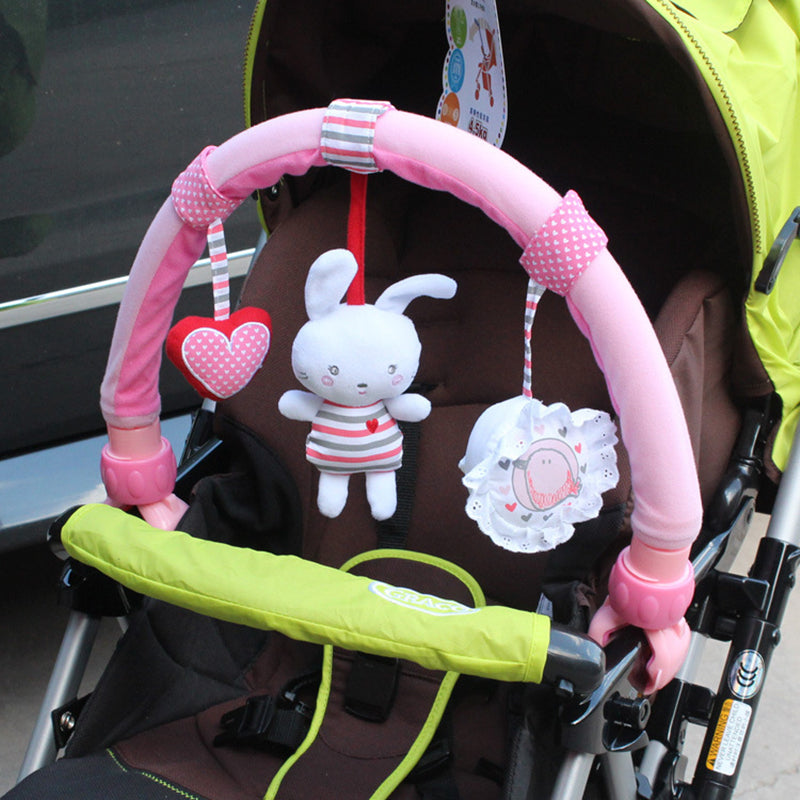 Baby stroller hanging toy with plush animal and clip for easy attachment

