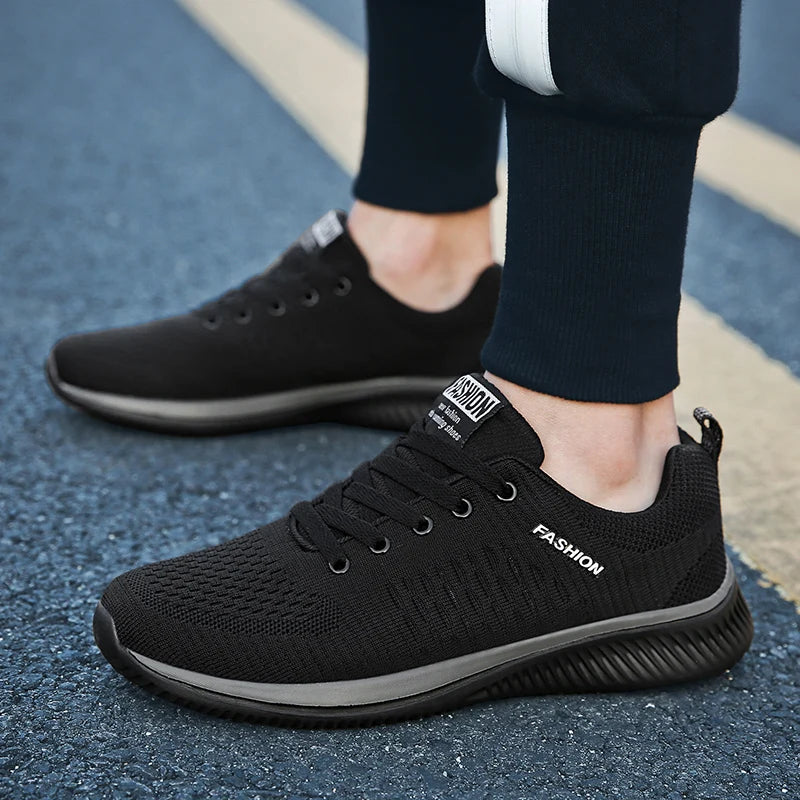 Men’s Casual Sneakers in black with breathable mesh and cushioned insole for walking

