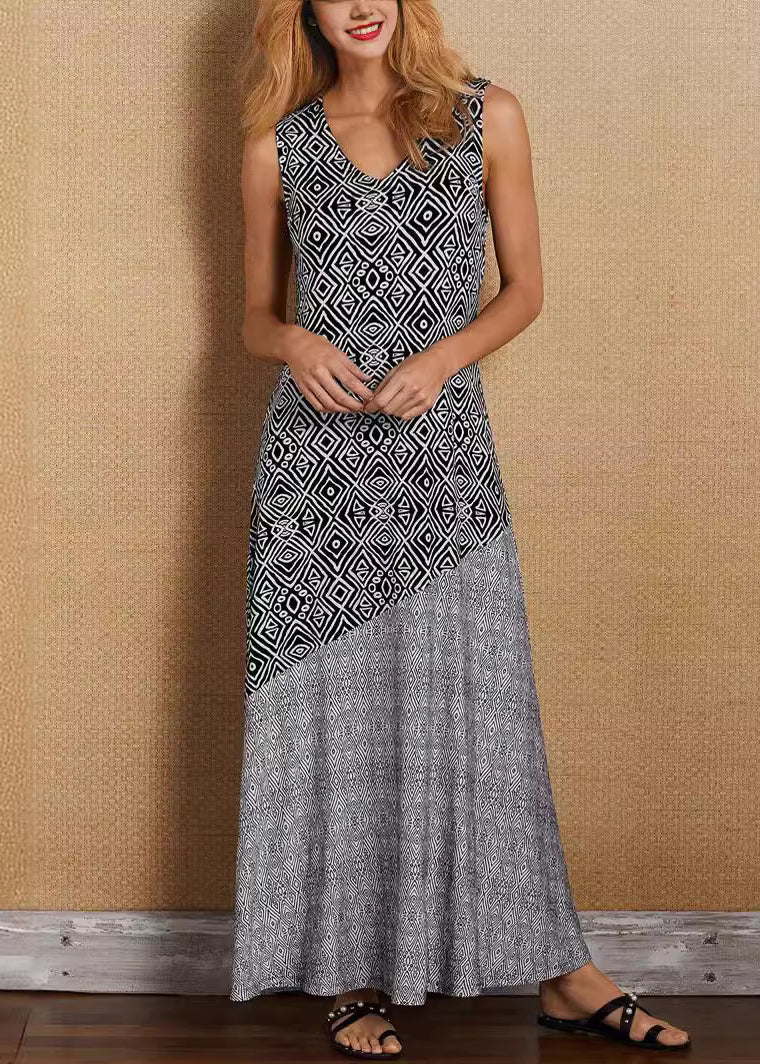 Woman in a French khaki V-neck maxi dress with patchwork print, perfect for summer casual and boho style.