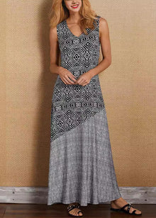 Woman in a French khaki V-neck maxi dress with patchwork print, perfect for summer casual and boho style.