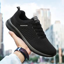 Men’s Casual Sneakers in black with breathable mesh and cushioned insole for walking

