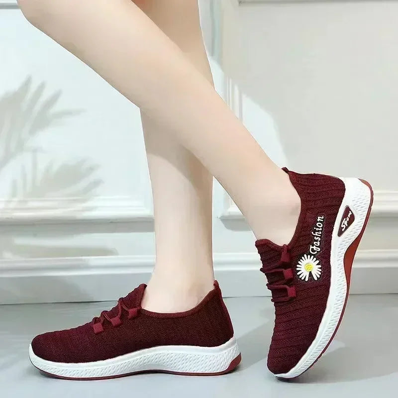 Woman wearing lightweight breathable casual sneakers outdoors


