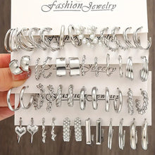 Close-up of elegant style hoop earrings with glossy finish and faux pearl accents