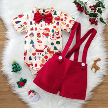 Newborn wearing festive bowtie Christmas romper with braces

