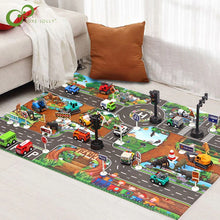 Toddler playing on a city-themed traffic road play mat with toy cars

