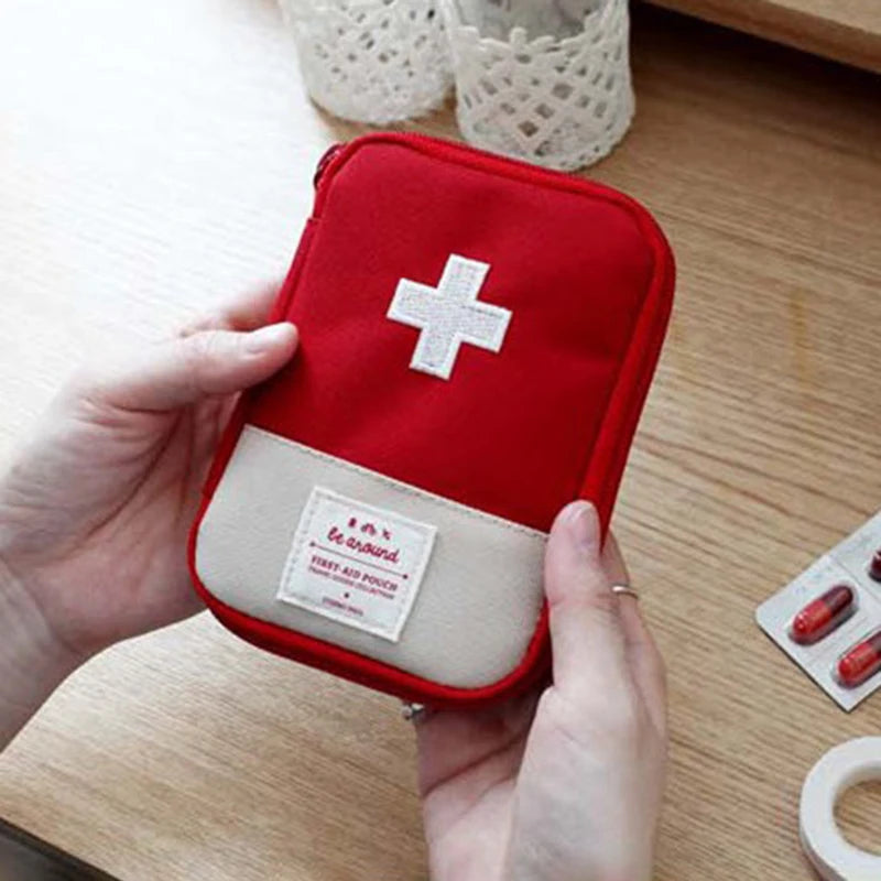 Mini first aid kit and portable medicine bag for travel, camping, and emergency use

