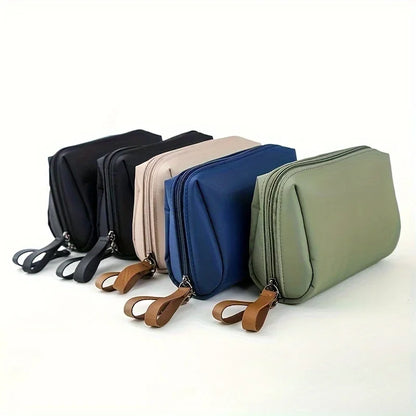 Portable makeup bag with solid color design for travel and daily cosmetic storage