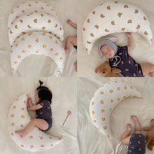Soft baby sleeping crescent pillow with cartoon print for neck and head support

