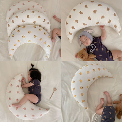 Soft baby sleeping crescent pillow with cartoon print for neck and head support

